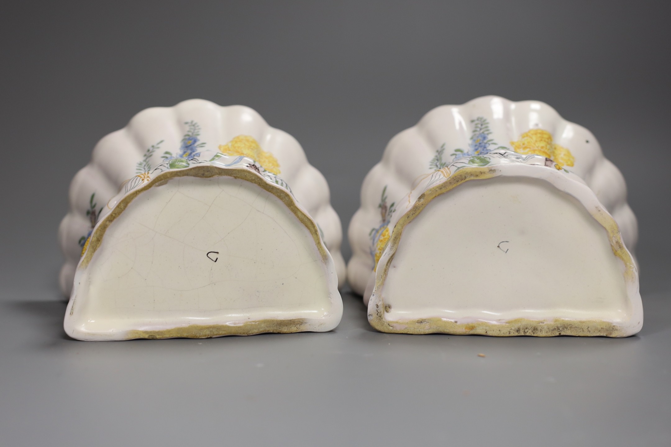 A pair of German faience flower decorated bough pots, late 18th century, 15.5cm wide